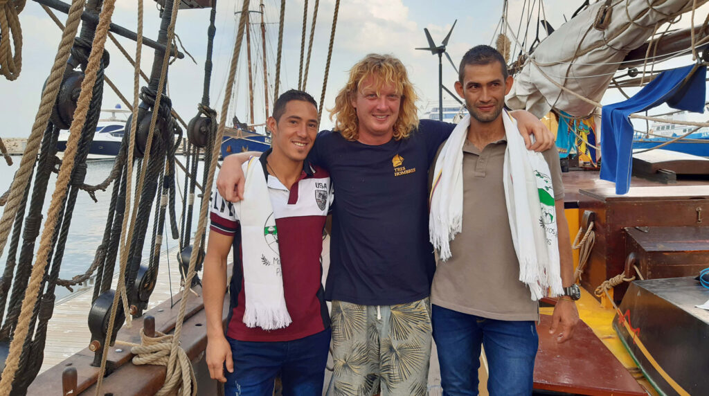 Hugo and Guillermo with the cpatain of the sailing boat Tres Hombres 